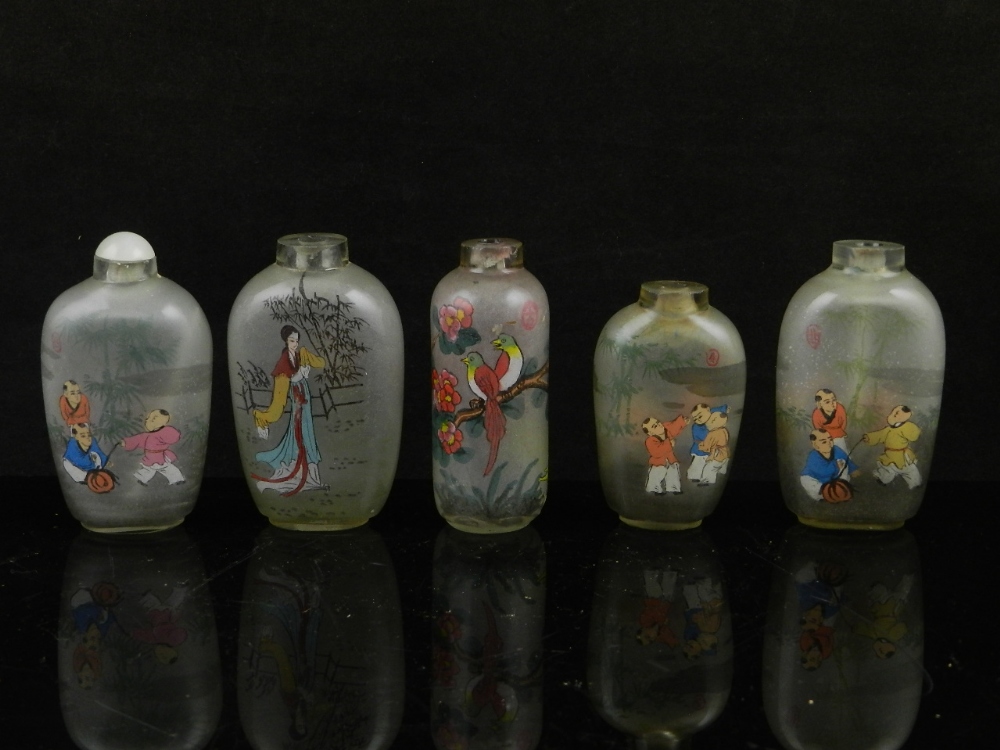 Five Chinese glass reverse painted scent bottles of various shapes, decorated figures and birds,