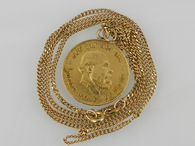 A Dutch ten guilder gold coin pendant, together with a fine curb link necklace stamped 375.