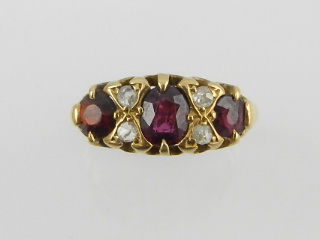 Late Victorian 19ct yellow gold ruby and diamond set dress ring, hallmarked Birmingham 1900/01.