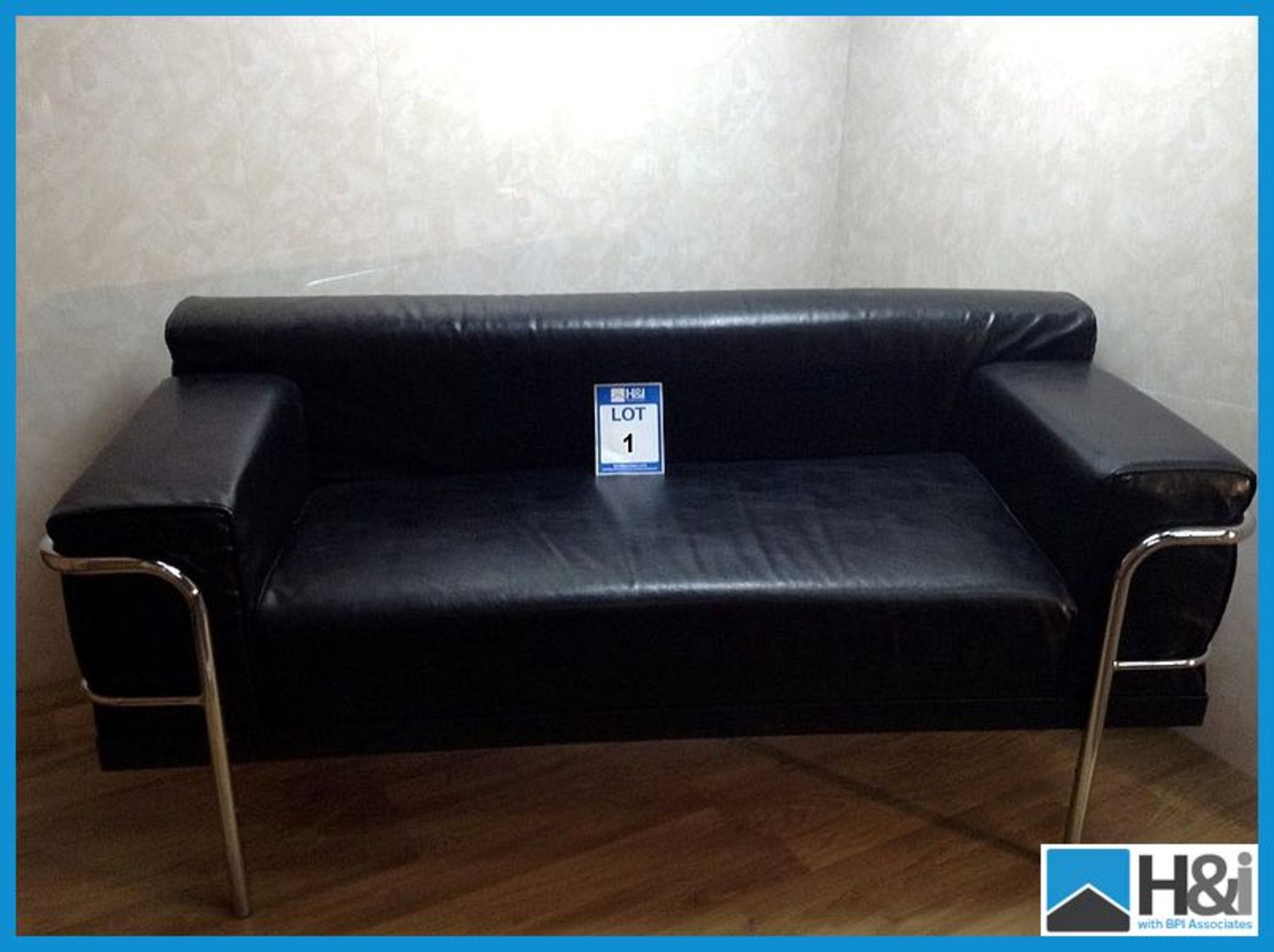 Stockholm style large Black 2 seater Leather modern settee with chrome surrounding frame and