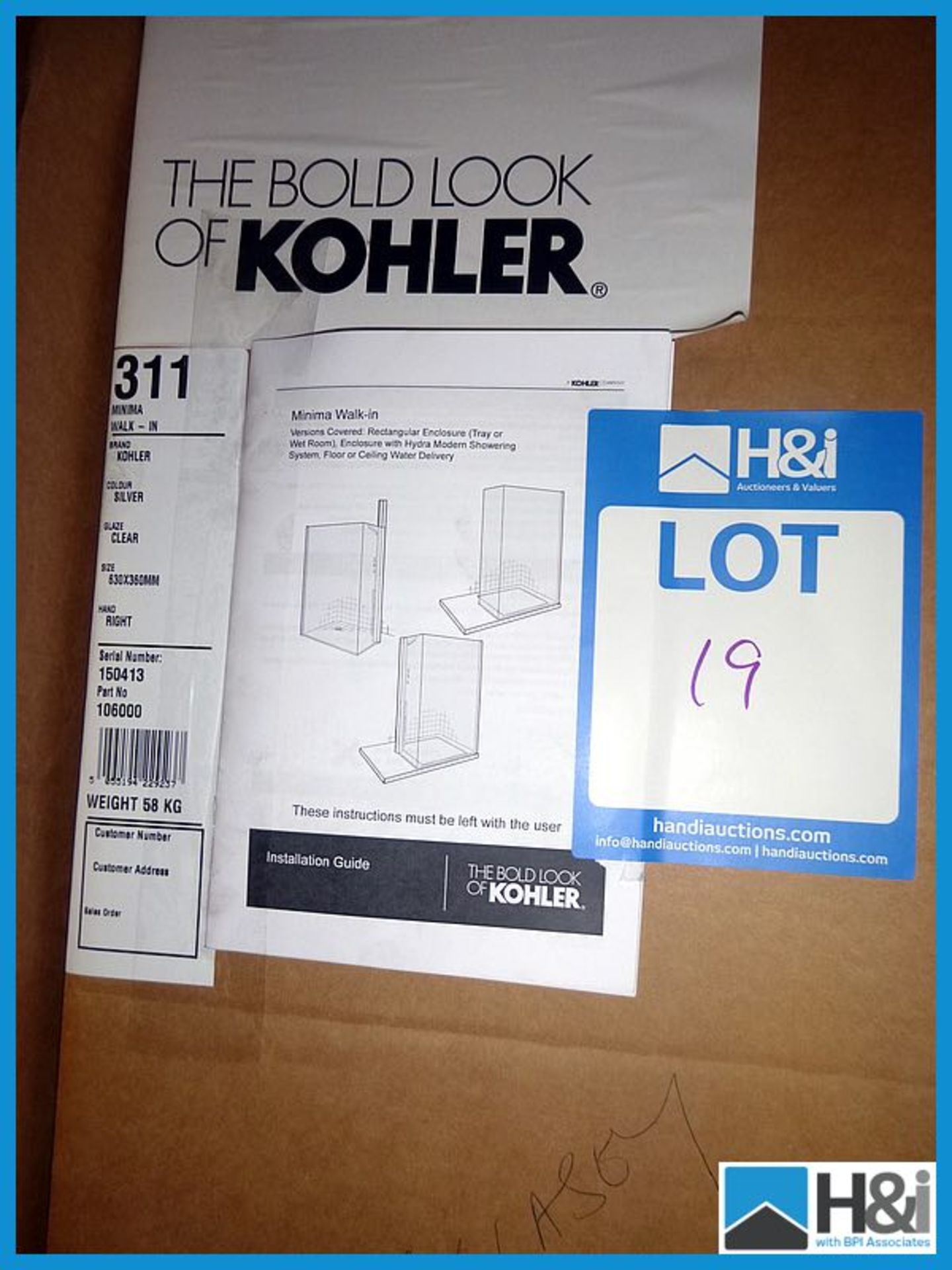 Stunning Kohler Minima walk in shower enclosure, silver finish, unused and boxed Appraisal: Good