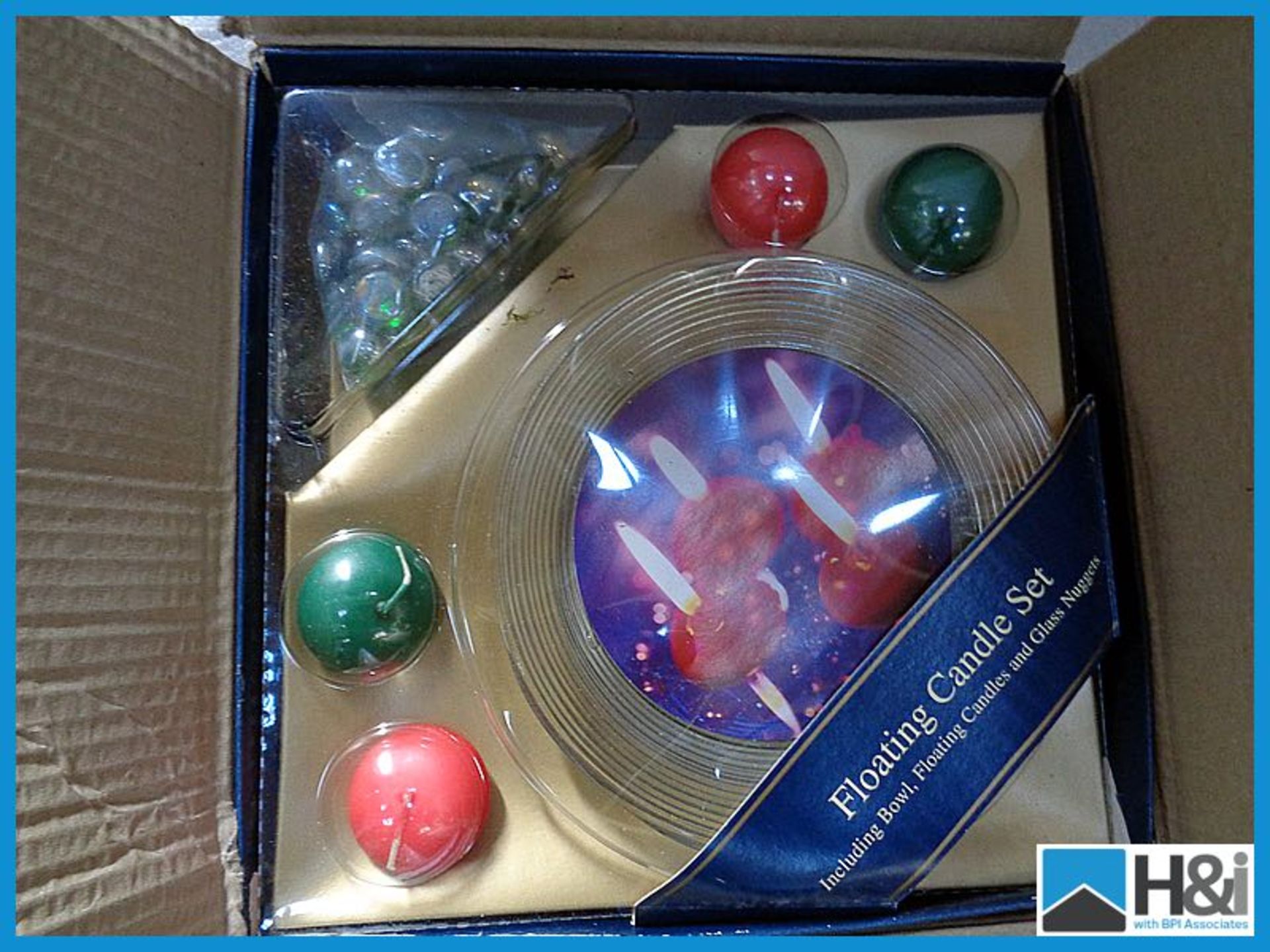 1 box of 3 x Floating candle set new perfect for xmas or any party !!!!! Appraisal: Good Serial