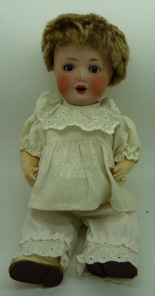 A German bisque head doll, marked 4890, W.K. & Co., Gräfenthal, Germany, 17, height 30cm