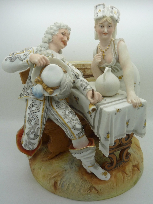 A 19th Century continental figure group, height 25cm