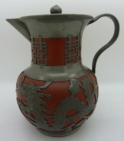 A Chinese pewter and terracotta jug, height 14cm