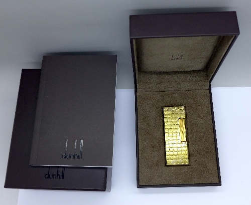 A Dunhill lighter with box