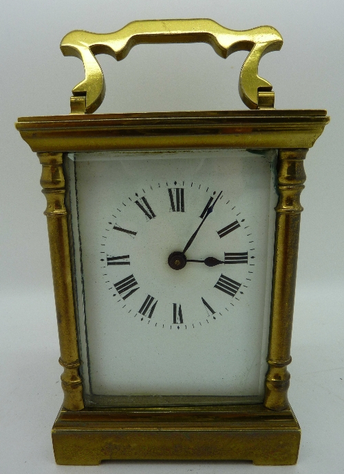 A brass carriage clock, height 11cm