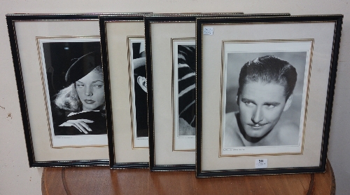 A set of four film star prints, framed