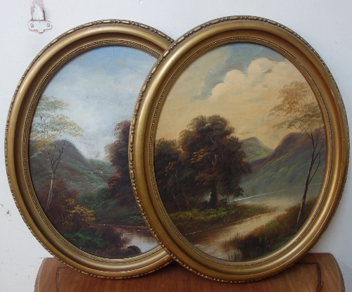 Early 20th Century English School, pair of oval river landscapes, oils on board, framed