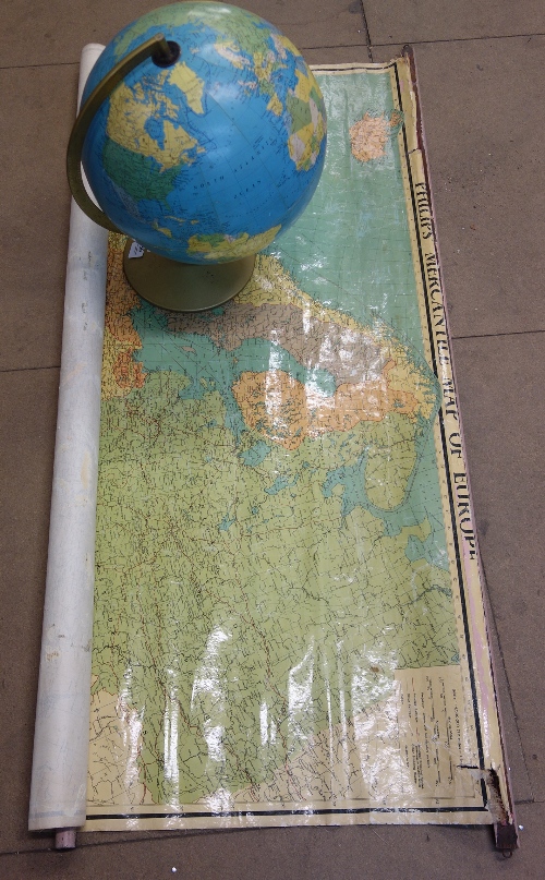 A terrestrial globe and a map