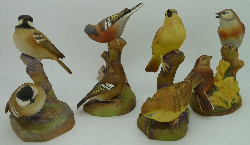 Four Royal Worcester bird figures, Yellow Hammers, 3377, chip to beak, Coal Tits, 3376, Linnets,