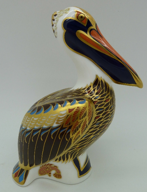 A Royal Crown Derby paperweight, Brown Pelican, with silver stopper