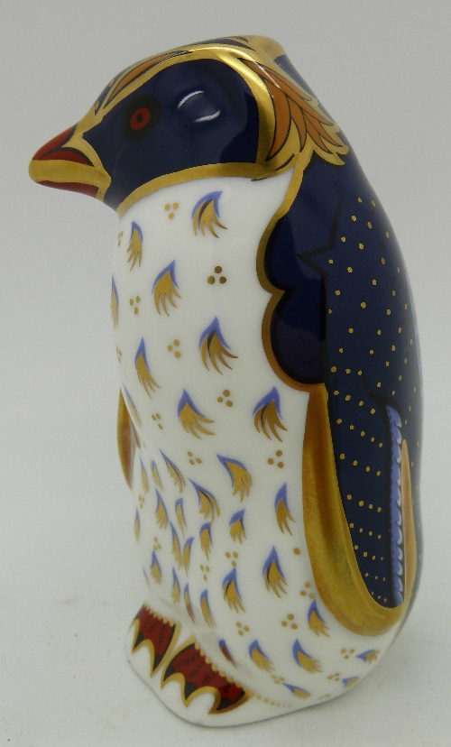 A Royal Crown Derby paperweight, Rockhopper Penguin, designed by John Ablitt, with gold stopper