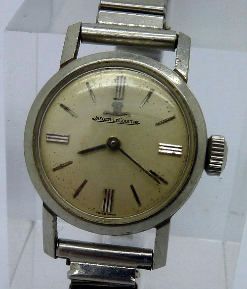 A lady`s stainless steel Jaeger-LeCoultre manual wind wristwatch, the circular silver dial with