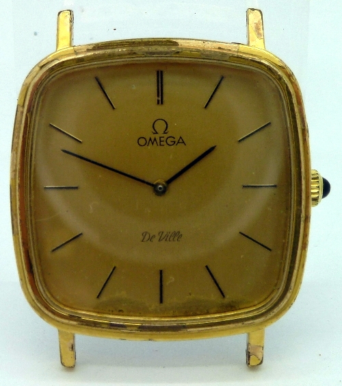 A gentleman`s gold plated Omega De Ville manual wind wristwatch, the gold dial with raised hourly