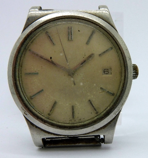 A gentleman`s stainless steel Omega wristwatch, the circular silver dial with raised hourly batons