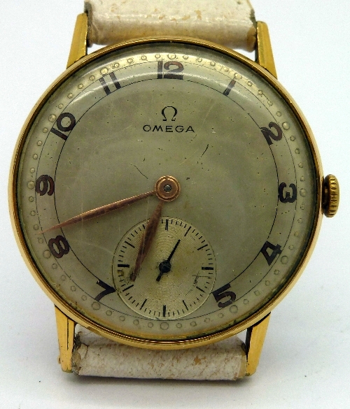 A gentleman`s gold plated Omega manual wind wristwatch, the circular silver dial with copper