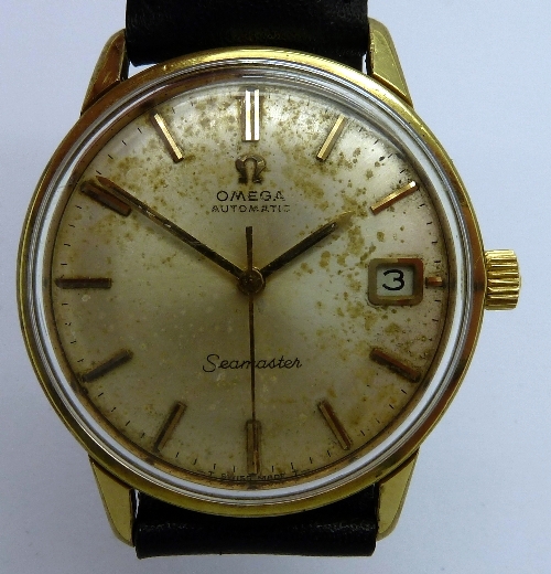 A gentleman`s plated Omega Seamaster automatic wristwatch, the circular champagne dial with raised