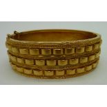 A Victorian yellow metal bangle, weight