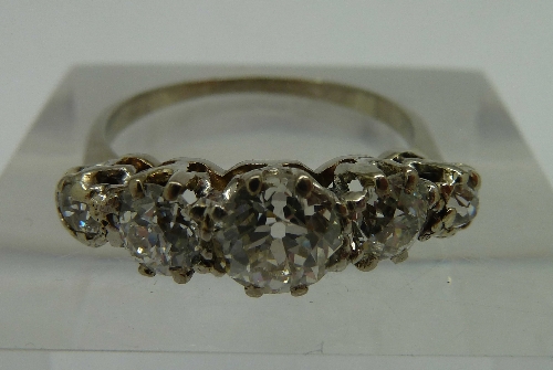 An 18ct white gold, old cut diamond, fiv