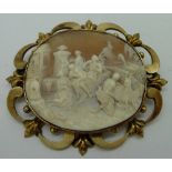 A large yellow metal mounted cameo brooc