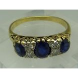 An 18ct gold, diamond and sapphire ring,