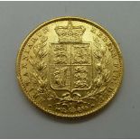 A Victorian 1871 shield back full sovere