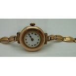 A lady's 9ct gold wristwatch on a 9ct go