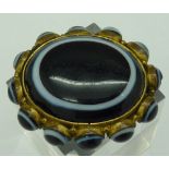 A Victorian bulls eye agate brooch, a/f