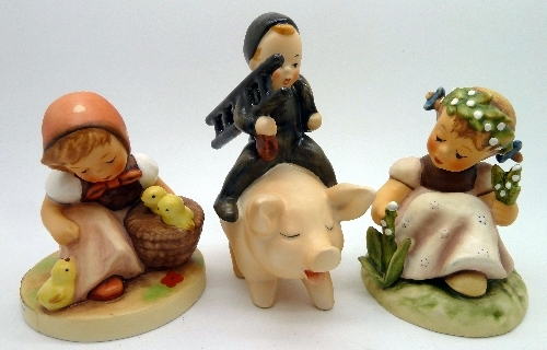 Two Hummel figures, Chick Girl and Garden Splendor and one other Goebel figure