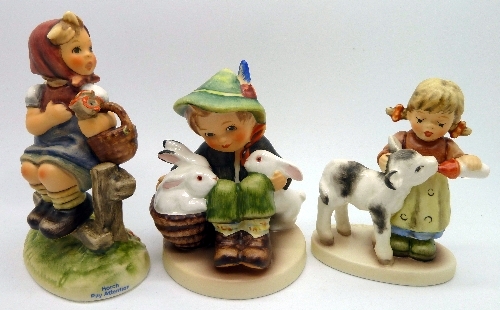 Three Hummel figures, Pay Attention, Friendly Feeding and Playmates, boxed