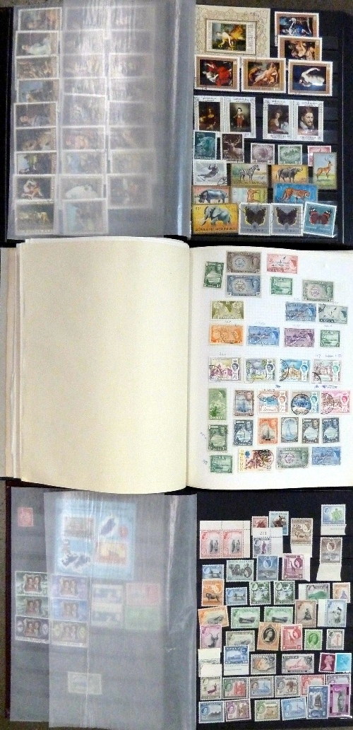 A collection of stamps, three albums, Canada, other Commonwealth and Worldwide