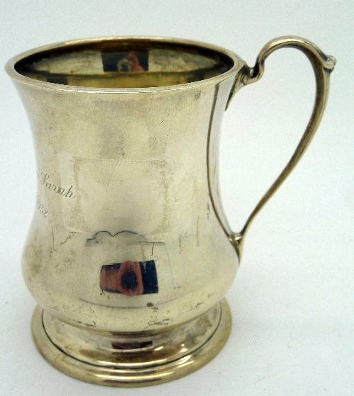 A silver Christening mug, Birmingham 1930, with inscription, weight 122.6g,