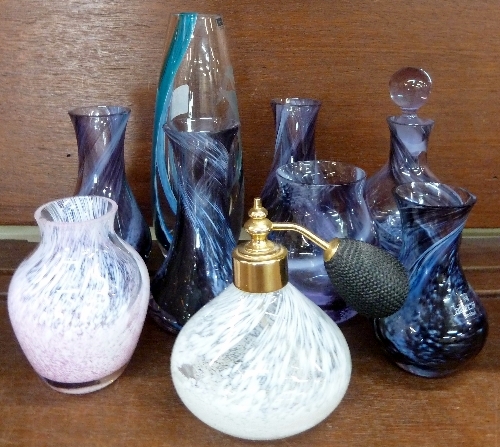 A selection of Caithness glass, purple, blue and pink vases and a perfume bottle