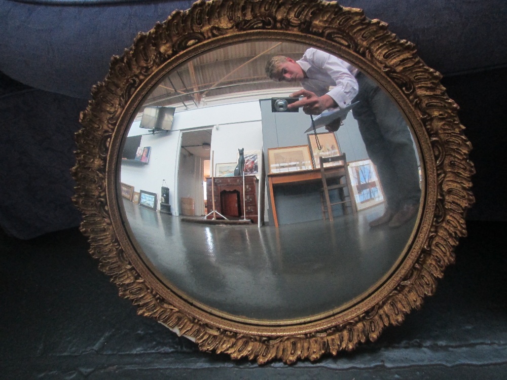 Vintage 1950s hall mirror with convex glass and decorative frame. 40cm diameter.