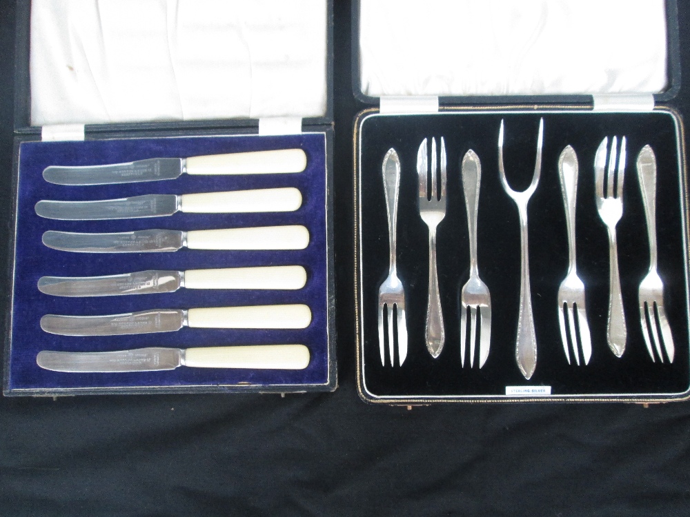 A George VI silver hallmarked set of six forks and a prong, by DP&co., Birmingham 1940/1, in their