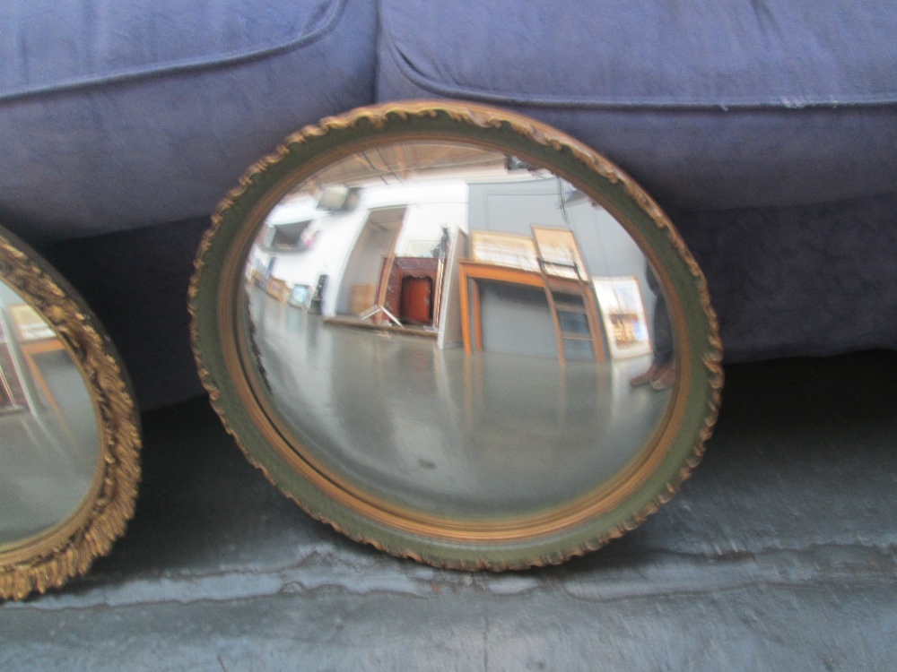 Vintage 1950s Atsonea hall mirror with convex glass and decorative frame. 40cm diameter.