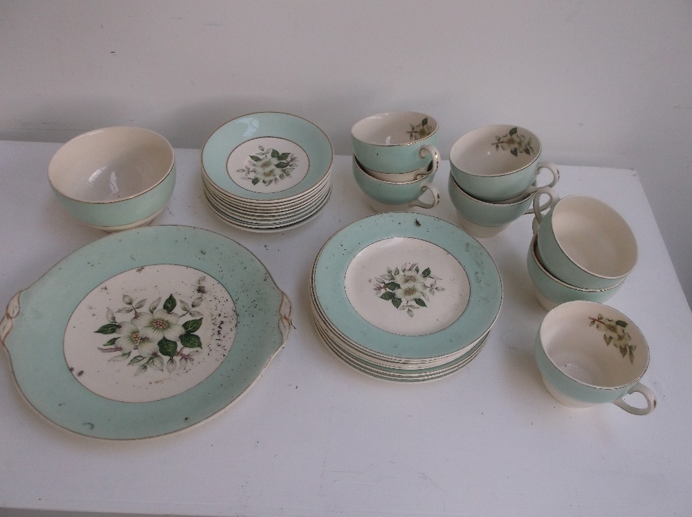 A Pareek Johnson Brother's part tea service of floral and turquoise design including, 7 tea cups,