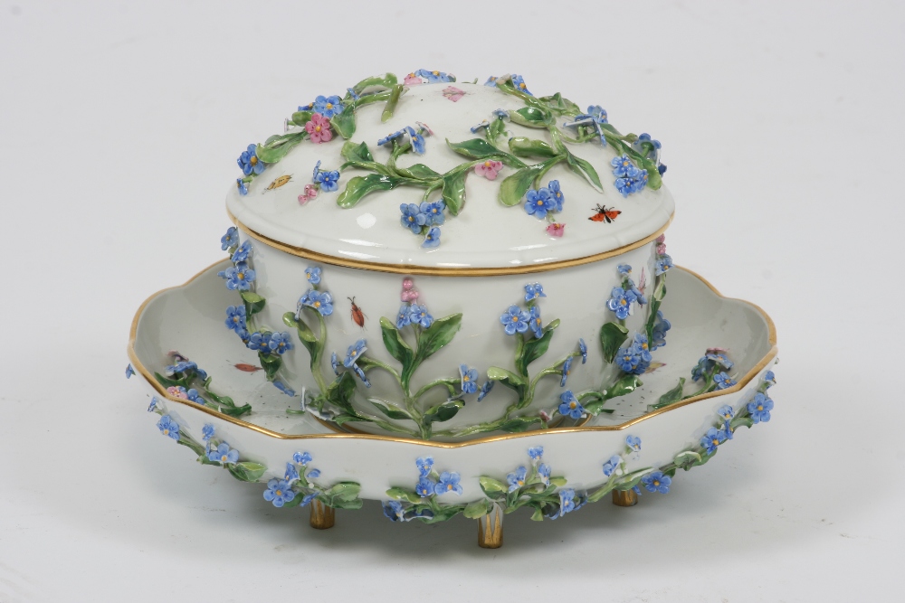 A 19tth Century Meissen bowl, cover and matching stand, with profuse floral encrusted decoration