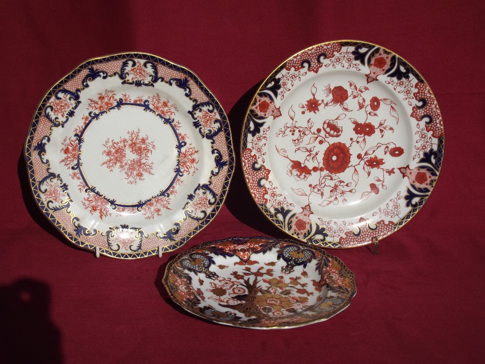 Ten Derby and Royal Crown Derby dinner plates, in the Imari pattern; a pair of similar style side