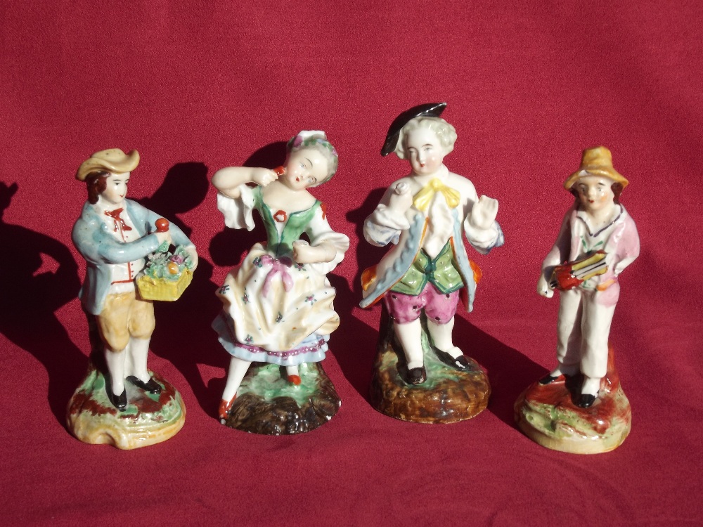 Four 19th Century porcelain figures, (some damage)