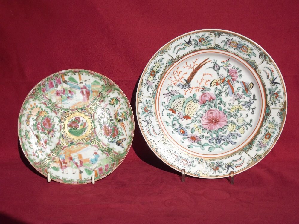 A 19th Century Canton plate, decorated with birds, figures, butterflies and flowers, 21cm dia.;