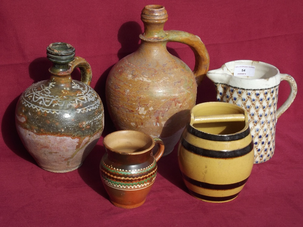 A collection of various Antique pottery jugs, mugs and pitchers, (5)