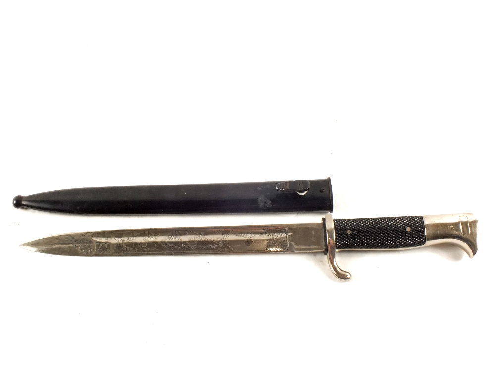 A German (PATTERN) parade bayonet with etched blade "In Memory of my Service"