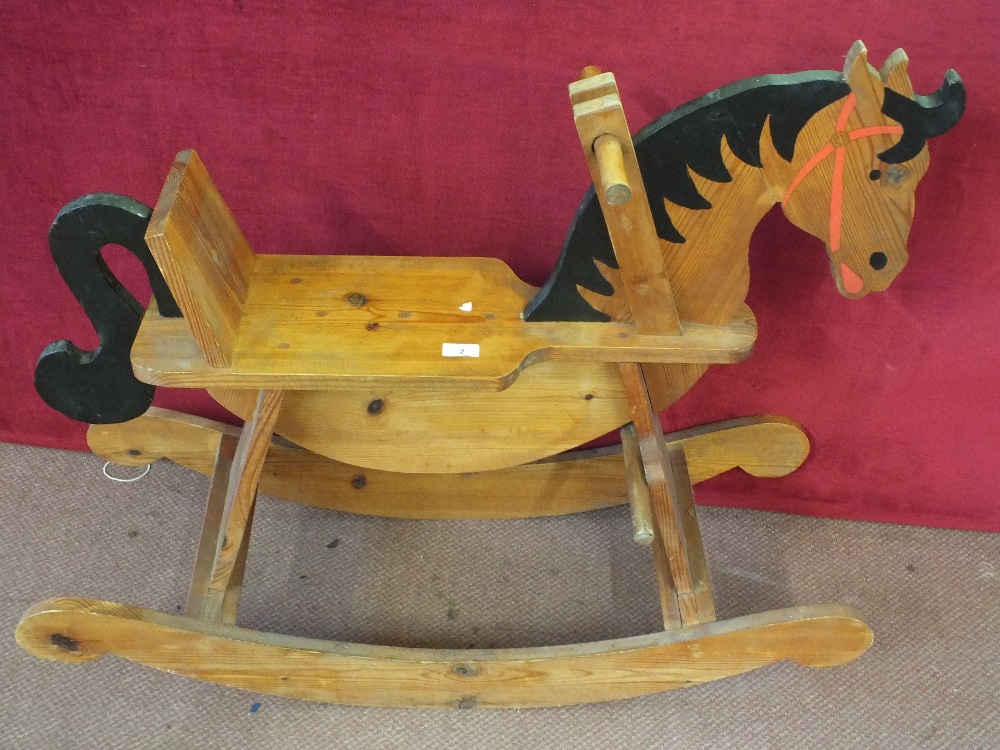 A wooden rocking horse