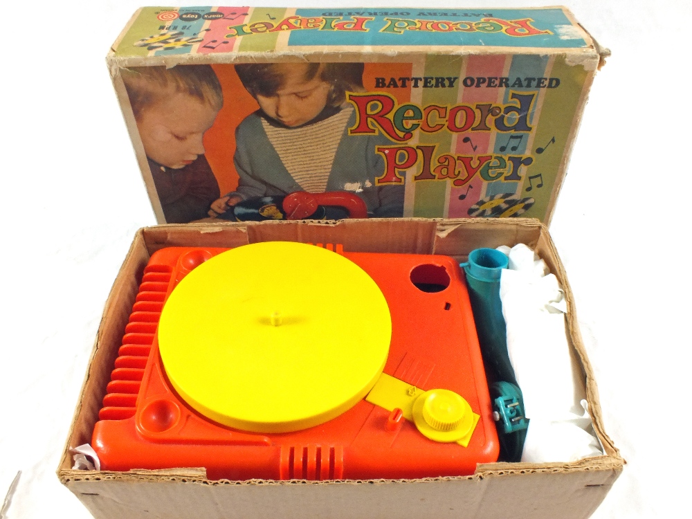 A boxed Louis Marx battery operated record player