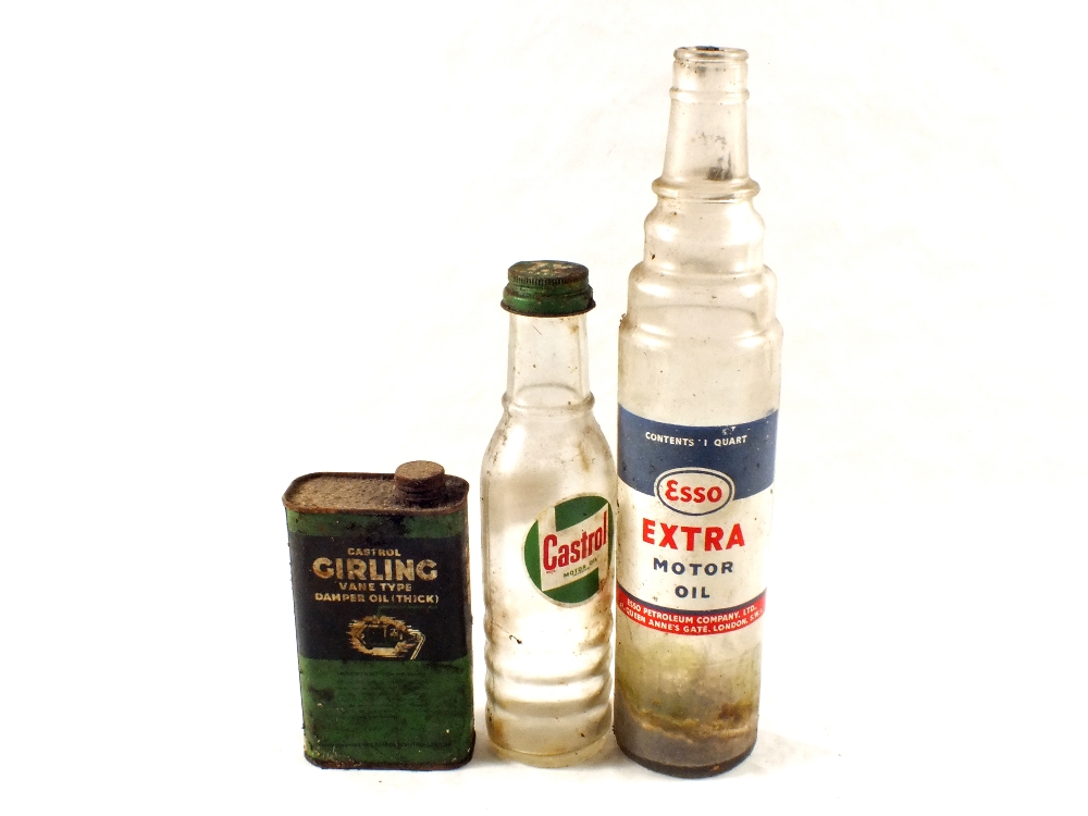 A one quart Esso oil bottle, Castrol Oil bottle and a Castrol One pint oil can