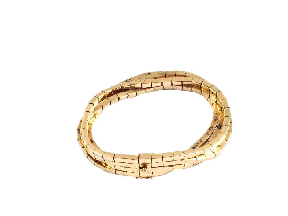 An 18ct Gold four strand bracelet