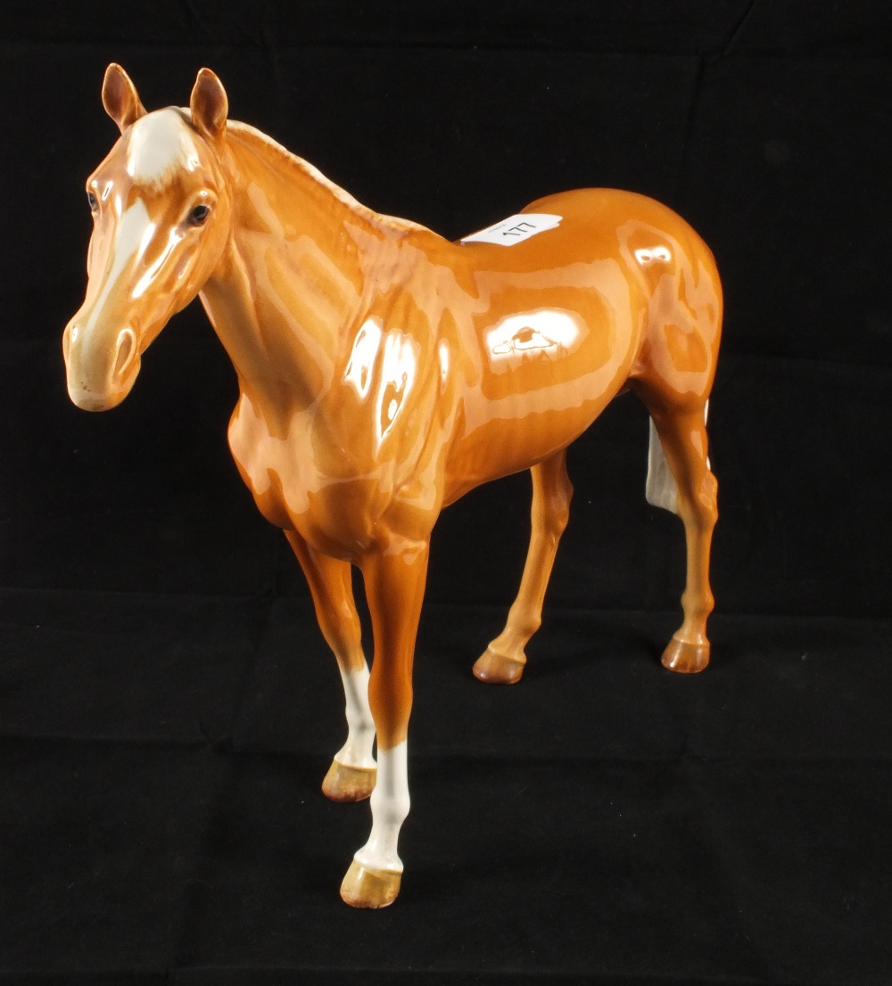 A large Beswick Palomino horse figure, height 11"
