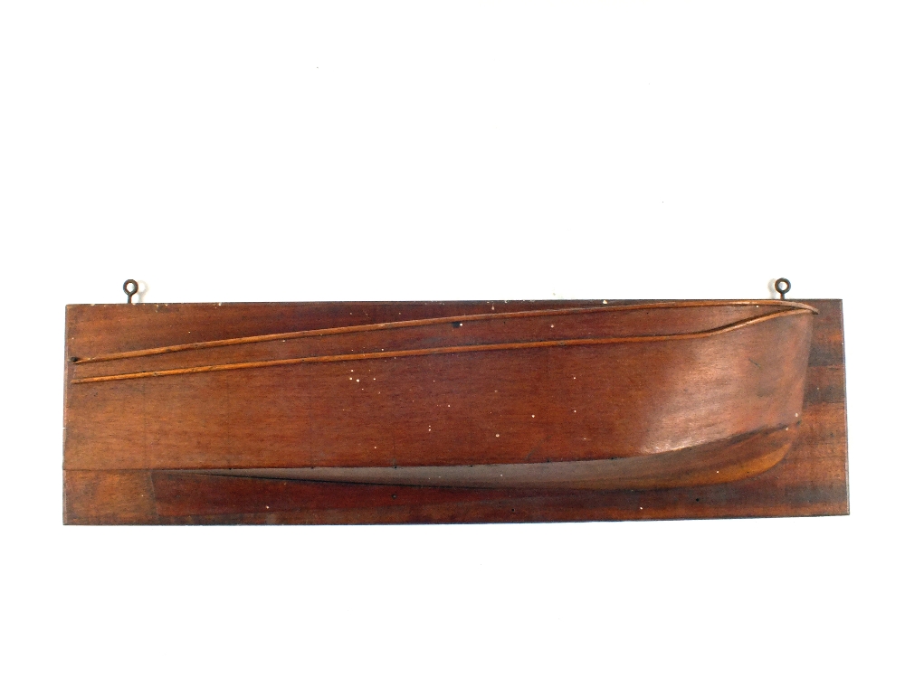 A wood half hull, drawing set etc